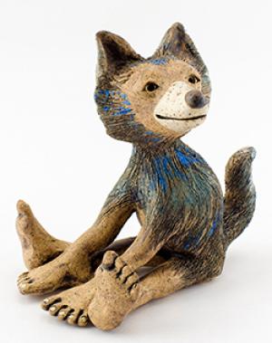 Coyote Sitting Pretty by Leanne Schnepp, photograph by Bill Norton.
