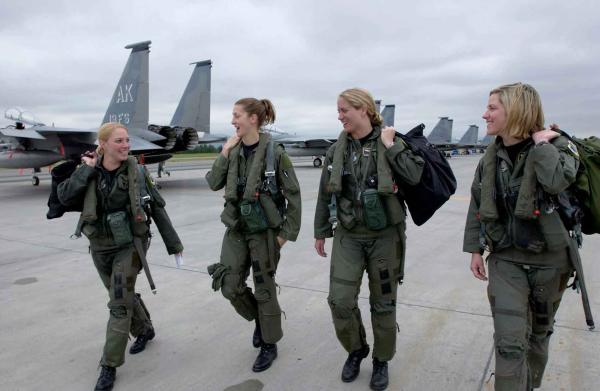 Four women soldiers walking on a tarmac. (U.S. Air Force photo/Tech. Sgt. Keith Brown)