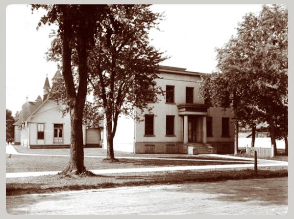 A photo of the first U-M hospital with its 1876 addition