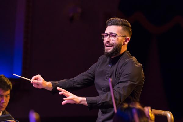 Photograph of LSO music director Tal Benatar