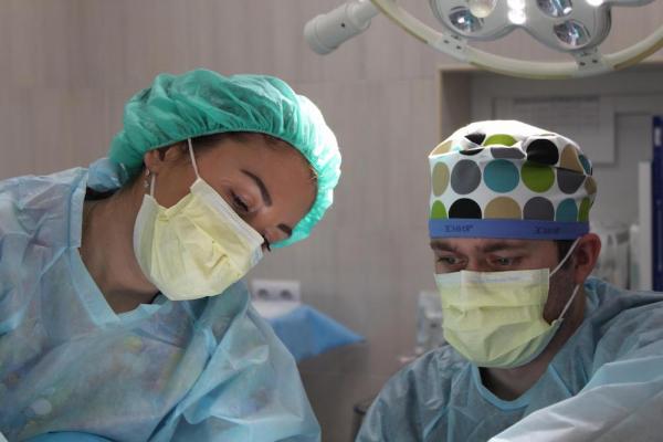 two surgeons in operating room