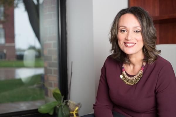 image of Tonya Allen smiling in her office at the Skillman Foundation