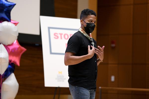 student telling story on stage