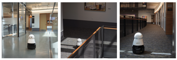 A robot moving around hallways in an office building