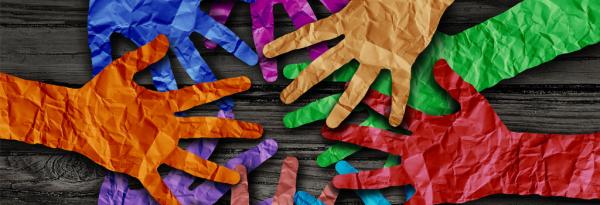Art piece depicting overlays of different colored hands