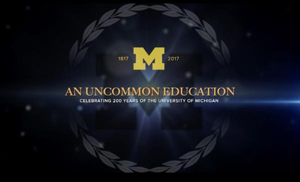 Poster of "An Common Education" with ring of leaves.