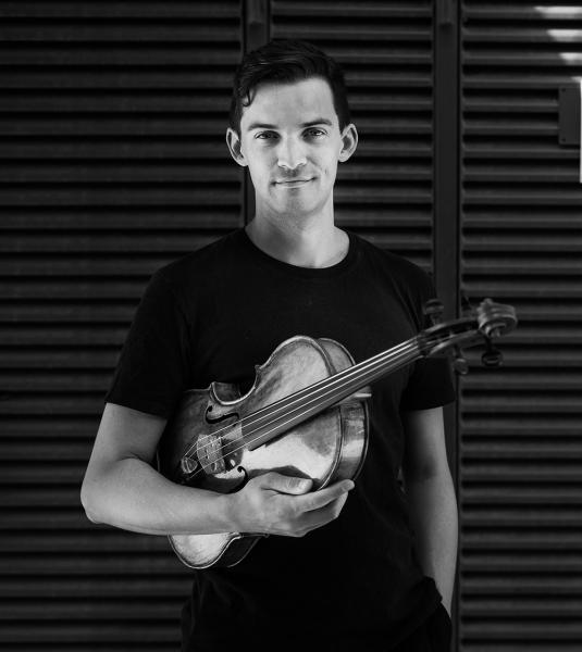Stephen Upshaw with his 1715 Daniel Parker school viola.