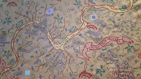 Close-up image of Cian Dayrit's "to block the flow of a river is to reject the wisdom of the earth," 2022, embroidery on cloth.