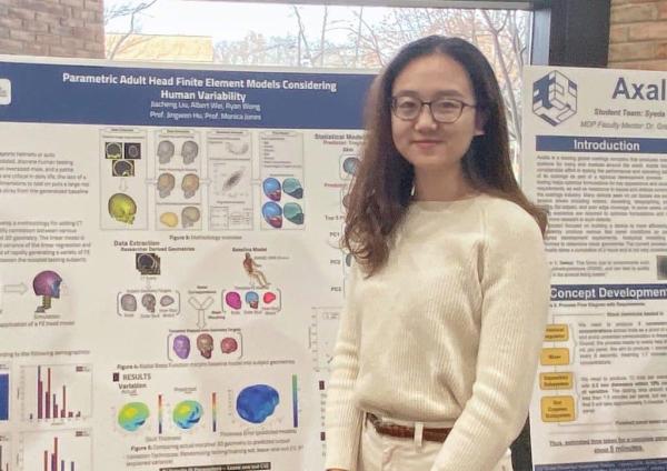 Portrait of Jiacheng Liu presenting a poster