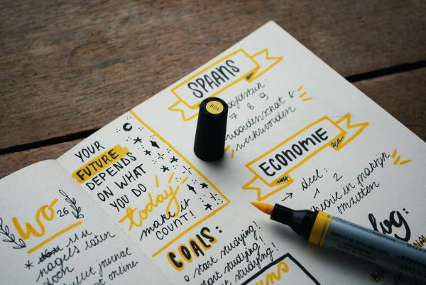 Notebook with yellow highlighter