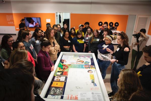 Students lead an exhibition tour at Stamps Gallery.