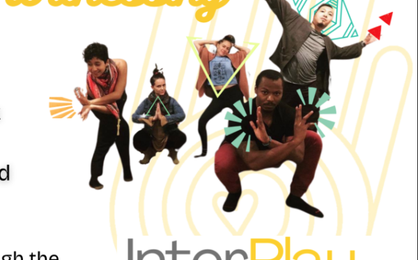 Group of people participating in artistic movement exercises.