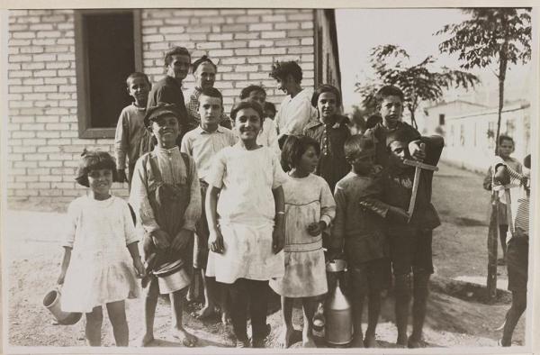 Children from Asia Minor in a refugee settlement in the harbor of Piraeus, Athens, 1923.  Photograph by Frank G. Carpenter (1855–1924). Source: Library of Congress.