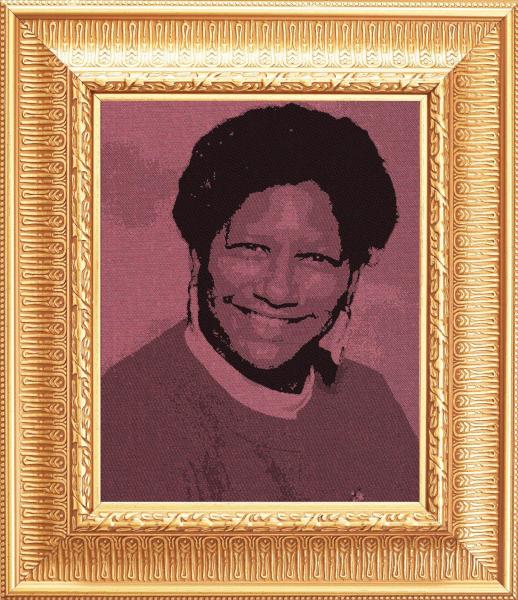 A photograph of a smiling Black woman is reproduced on red-tinted facbric, surrounded by a large gold frame