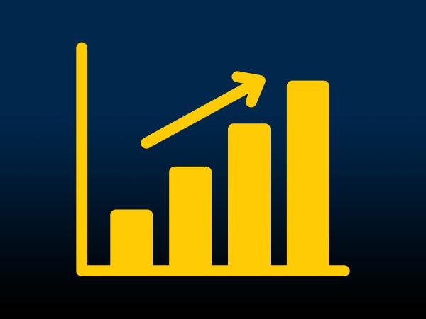 An icon of a bar graph with an arrow pointing upwards