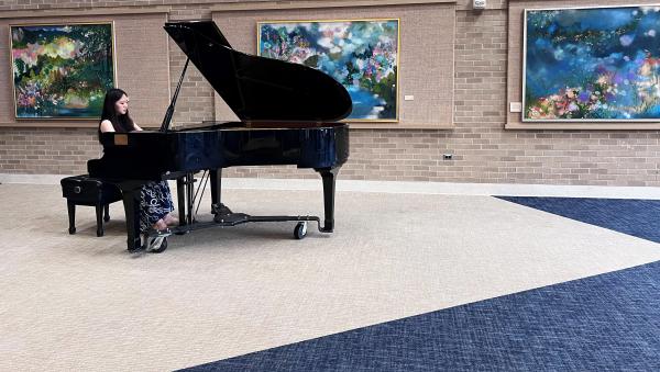 Student playing piano