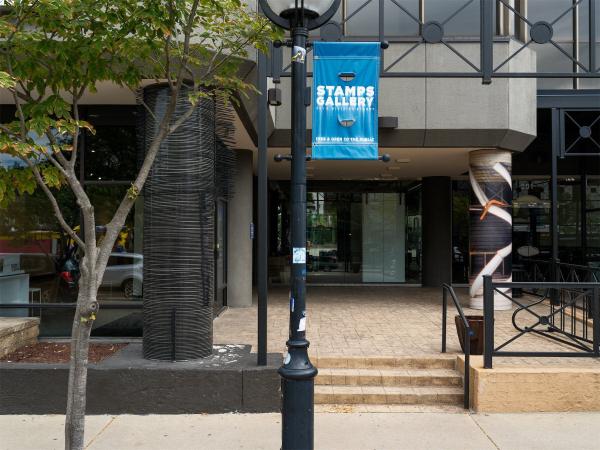 The Division St. front facade of Stamps Gallery, showing pillars designed by Abhishek Narula and Nate Byrne.