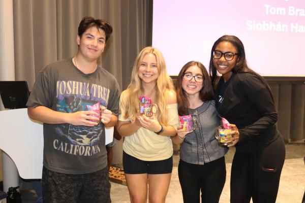 Photo of participates after winning aMplify Jeopardy!