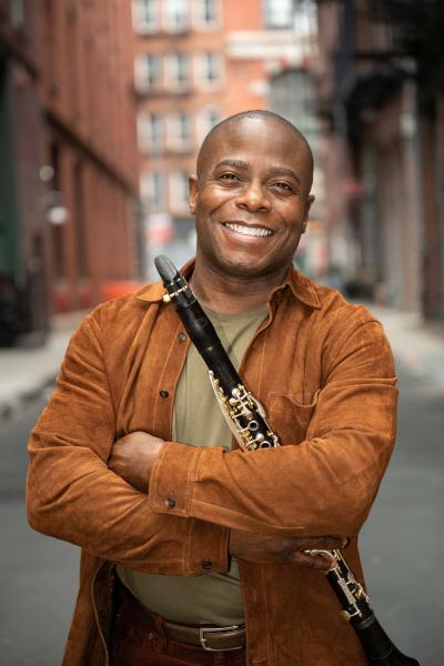 Man smiling with clarinet