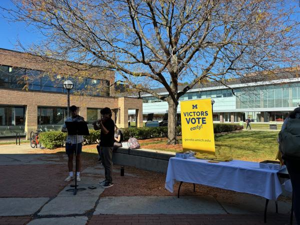 Musicians outside the Campus Voting Hub at the Duderstadt Center Gallery