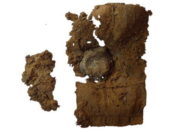 Folded and sealed magical papyrus 36345 (not the fragmentary papyrus containing the “Iliad”). © Photo: Leah Mascia. Courtesy of the Archaeological Mission of the University of Barcelona.