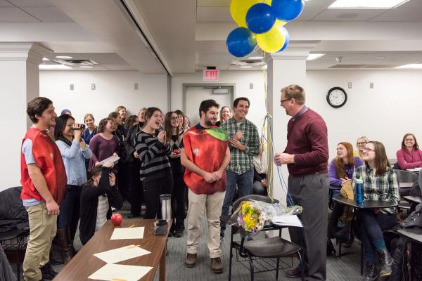 The Golden Apple committee surprises Dr. Strobbe during class.