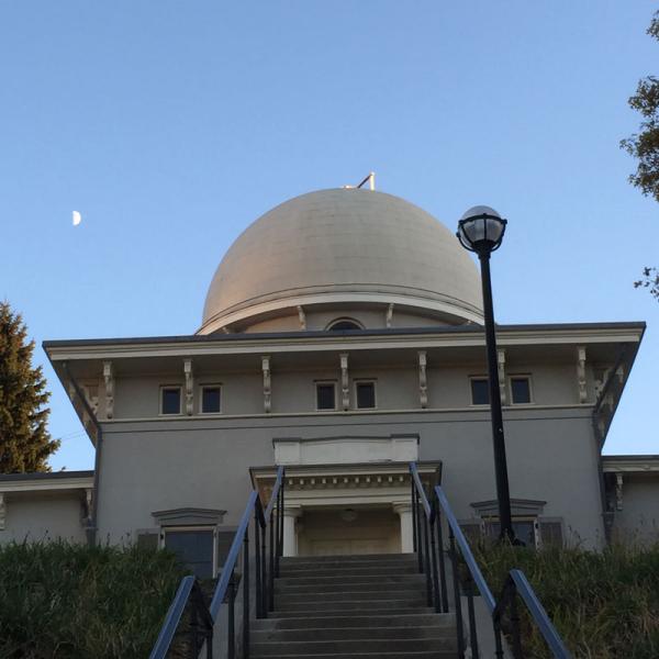 A first quarter Moon over the Detroit Observatory in late afternoon
