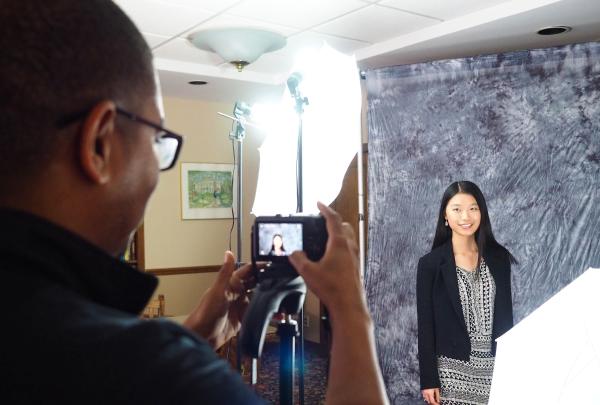 Student having their LinkedIn photo taken during Career Expo