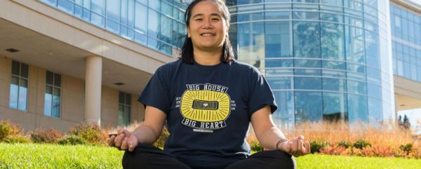 Woman sitting in yoga position.