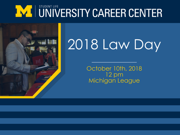 Student at an info table during a past Law Day