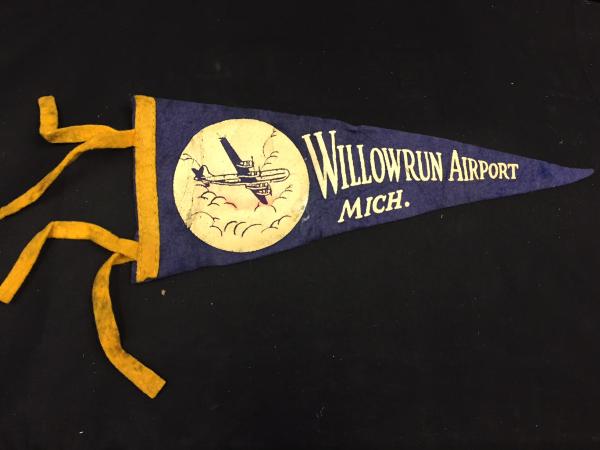 Photograph of Willow Run banner, courtesy of Yankee Air Museum. High resolution version available upon request.