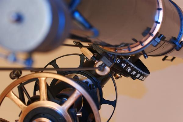 Close-up image of a telescope.