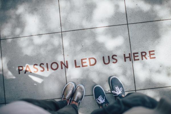 words on the ground "passion led us here"