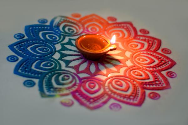 Rangoli made using stencil on Diwali festival celebration.